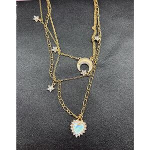 necklace with moon ,flowers and a heart